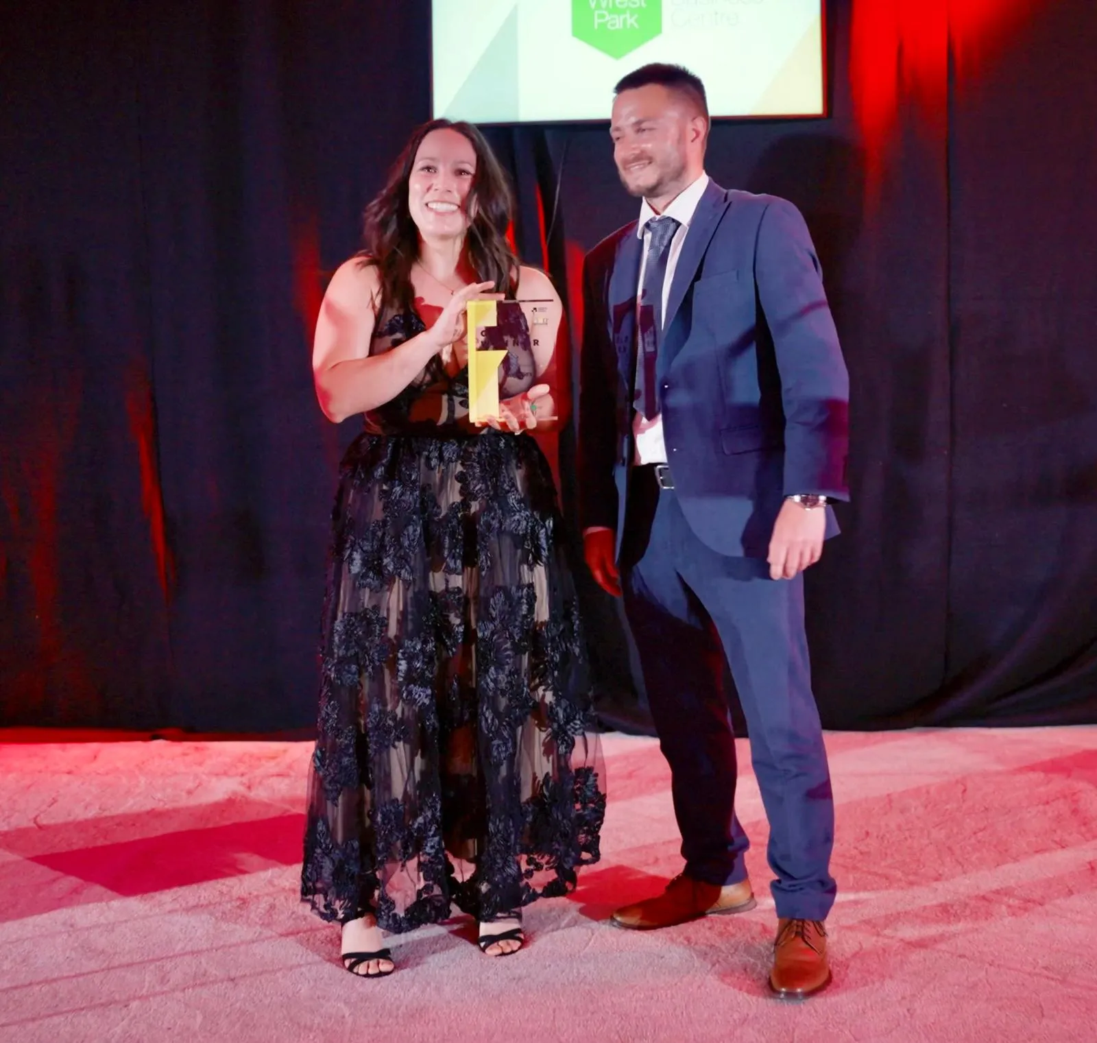 The NeuroFX Best New Business Gold award being presented on stage at the SME Bedfordshire Business Awards 2026